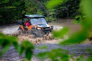 Orange UTV In Water